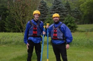 Greg Furer and Timothy Sparks in helmets and life vests before launching on the Upper Yough
